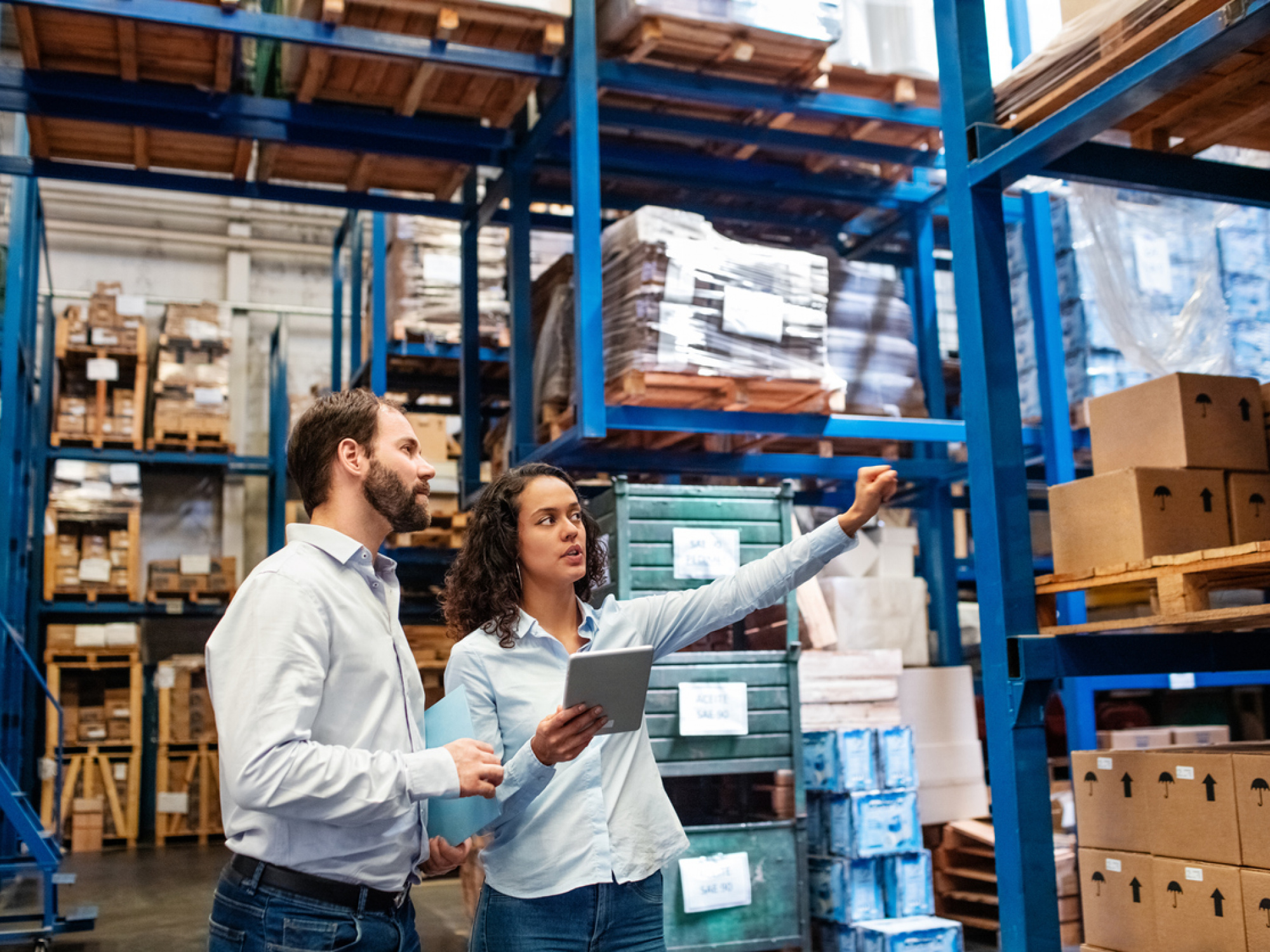 Two workers in a warehouse